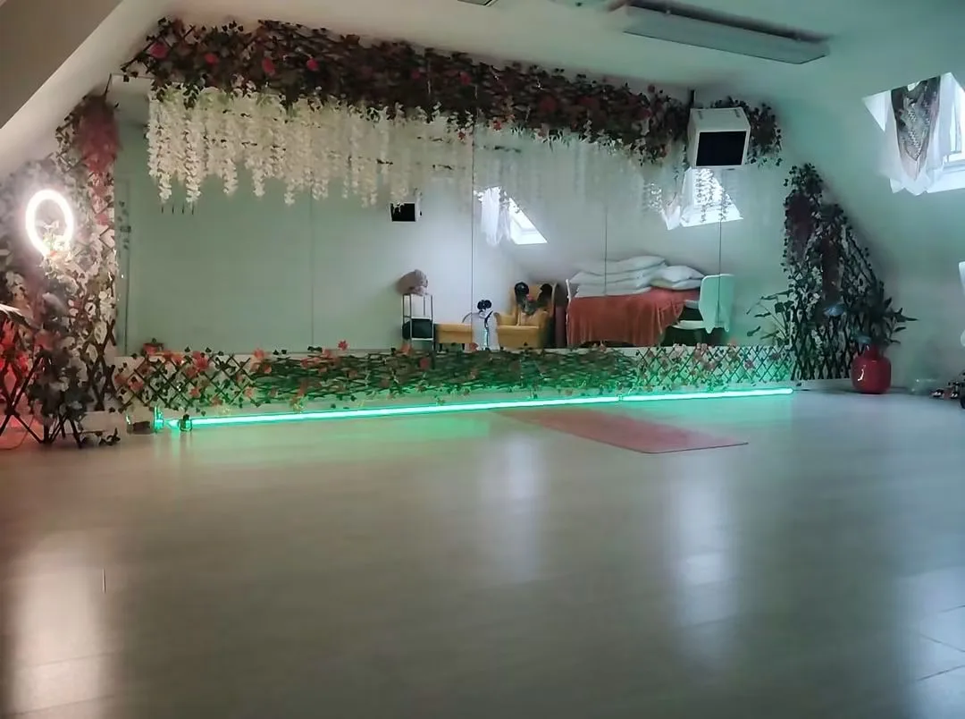 The class floor in Majella's studio, lit by the mirrored wall